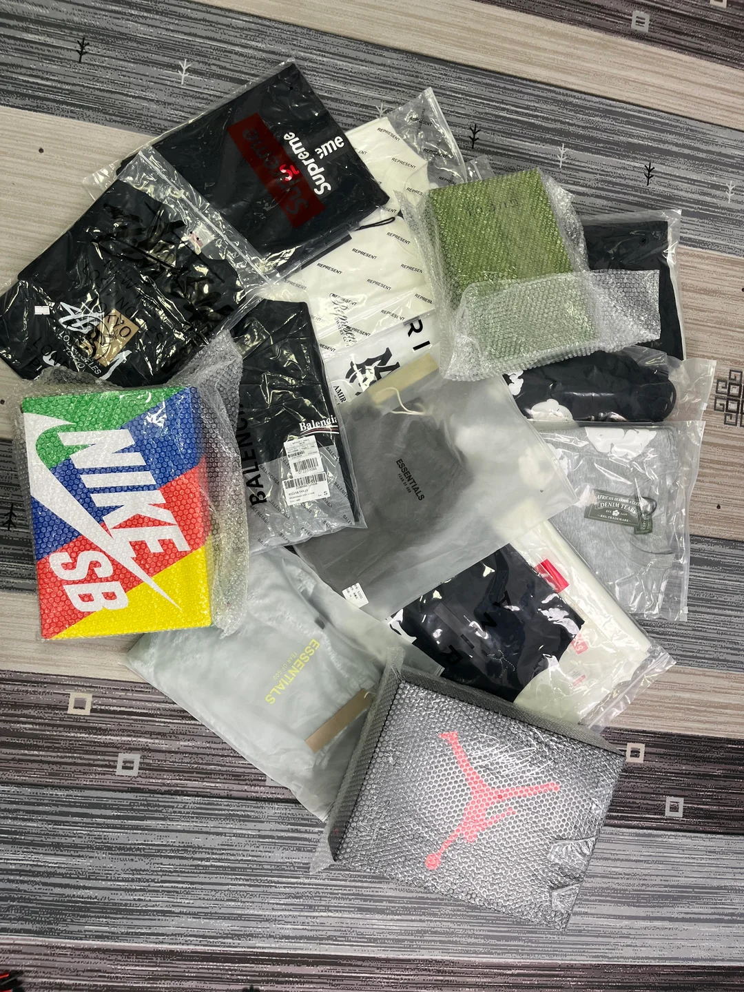 Wrapped clothing, footwear and accessories after opening the Czech haul