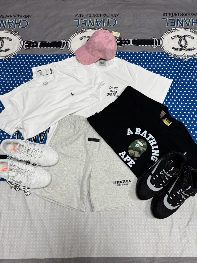 Clothing, shorts, cap and two sneaker pairs arranged from the UK LoongBuy haul